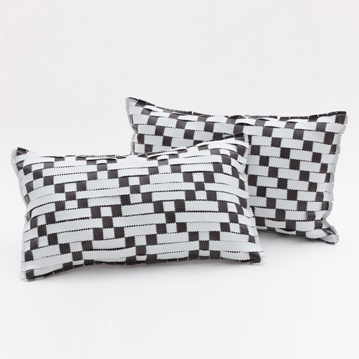 white and grey leather cushion