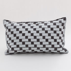 white and grey leather cushion